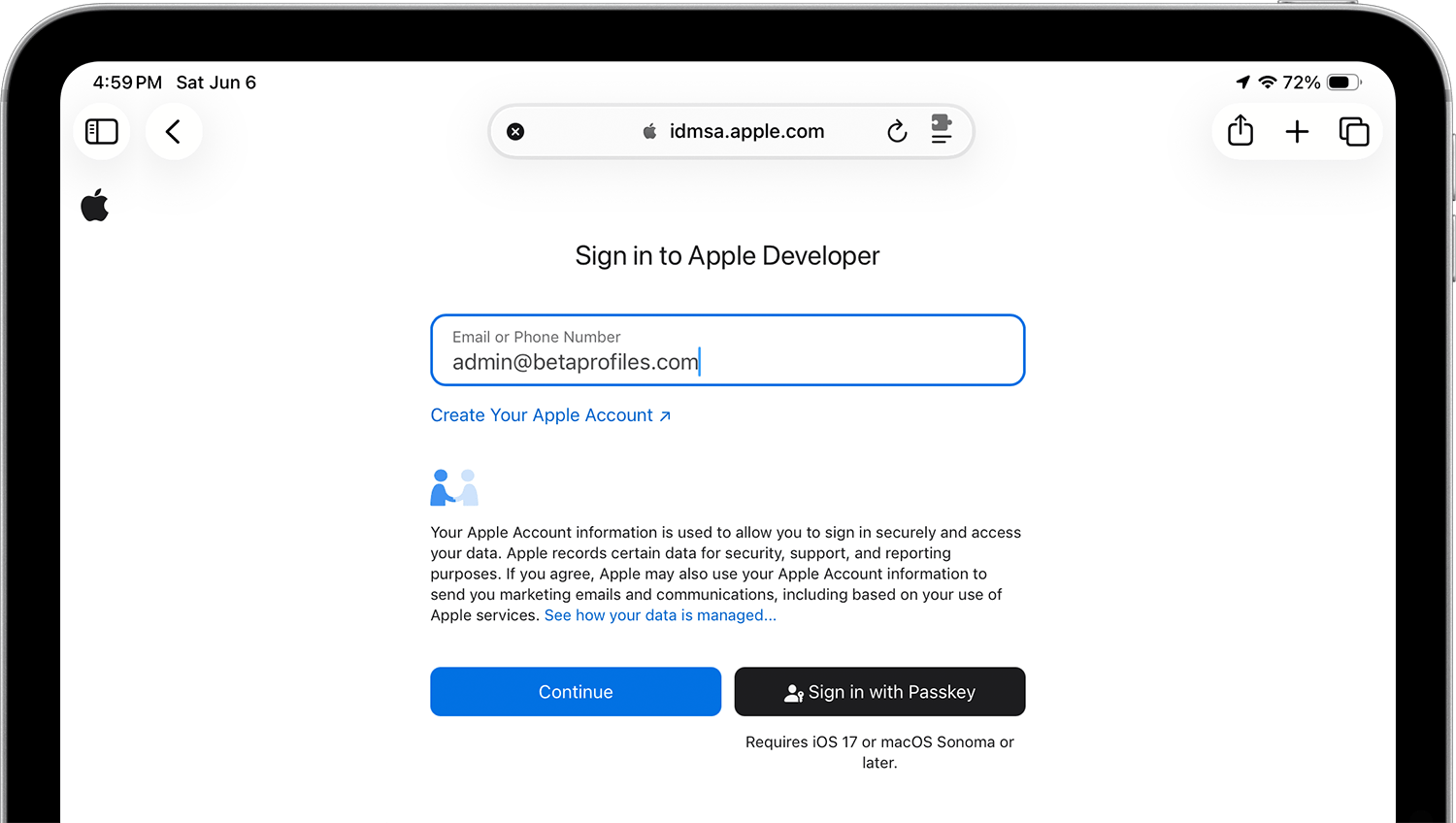 iPad screen showing the Apple Developer sign-in page.